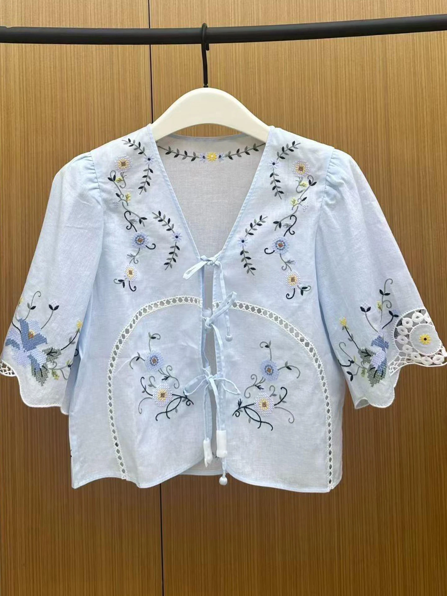 

Elegant V-neck Floral Embroidery Shirt Top for Women Summer 2026 Simple Commute Style Loose Fit Short Sleeve Casual Wear