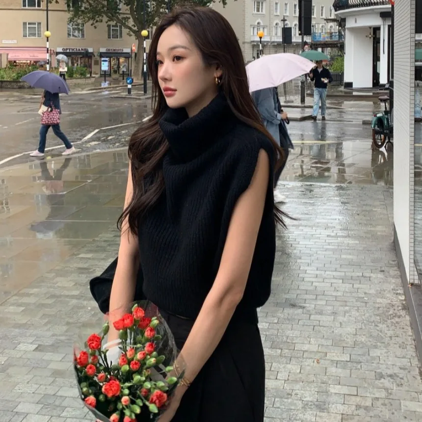 เสื้อไหมพรมคอสูงทรงเข้ารูปสำหรับผู้หญิง สไตล์เรียบง่าย ดูผอมเพรียว เหมาะสำหรับฤดูใบไม้ร่วง ไม่มีแขน ช่วงเอวเข้ารูป