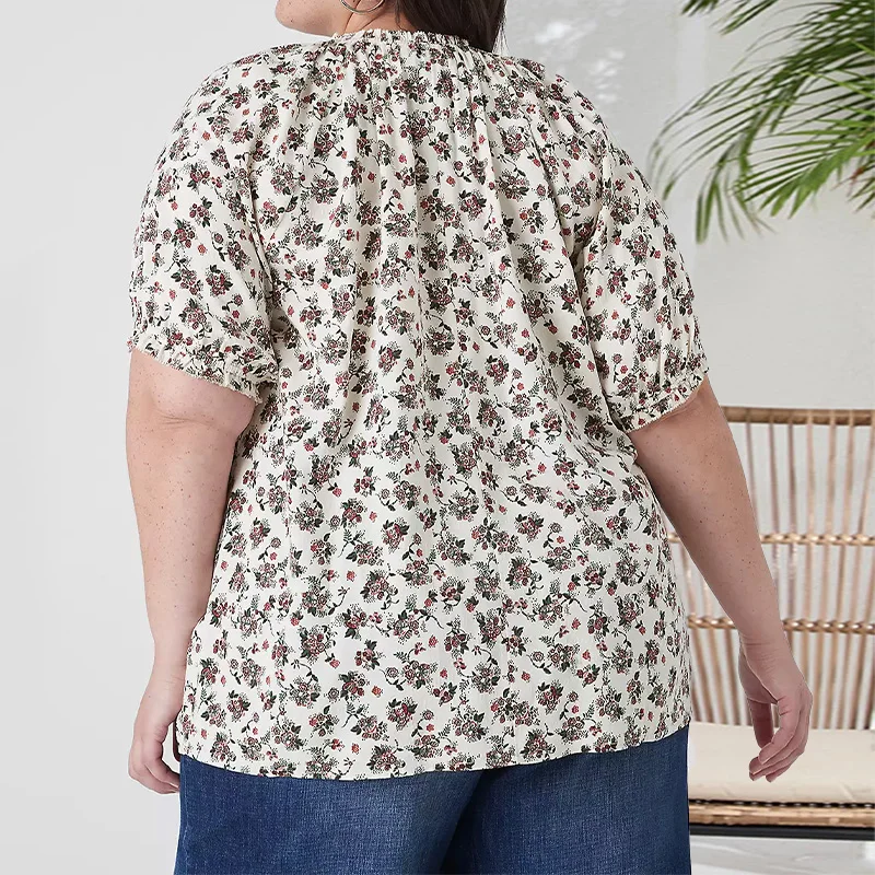 Plus-Size Women's Shirt with Floral Print, Puff Sleeves, Round Neck, Elasticated Cuffs and Neckline, and Draped Decoration on th