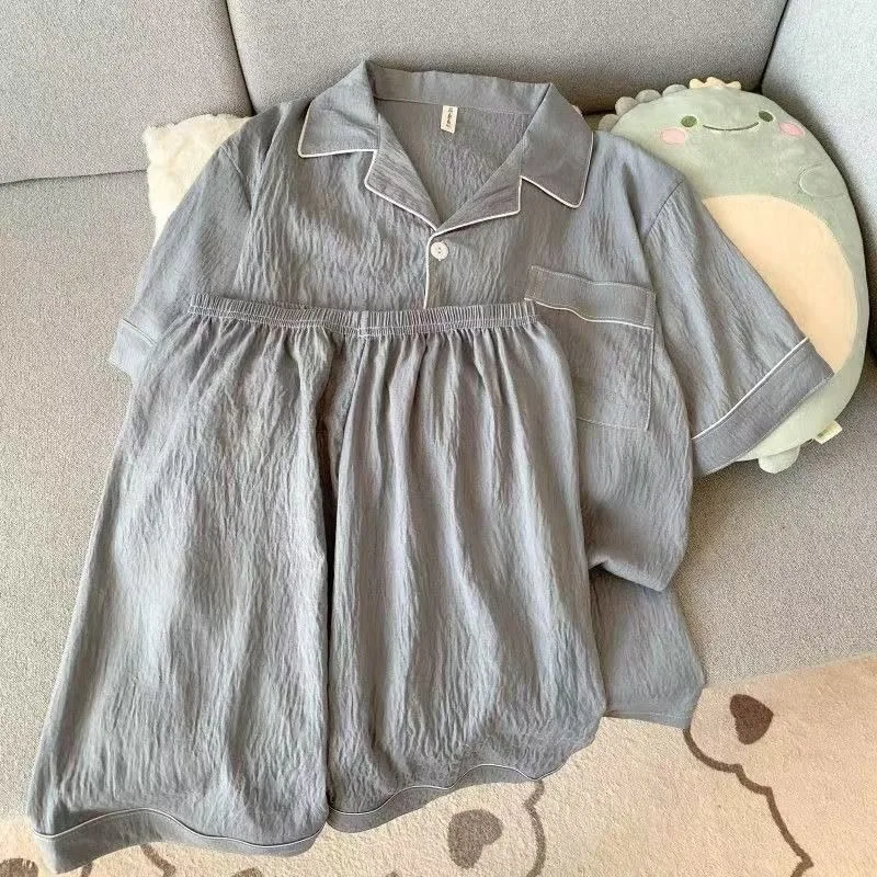 طقم بيجامة رجالي فاخر جديد بلون سادة وأكمام قصيرة وطية صدر السترة وسروال مرن مقاس كبير بيجامات صيفية ملابس نوم