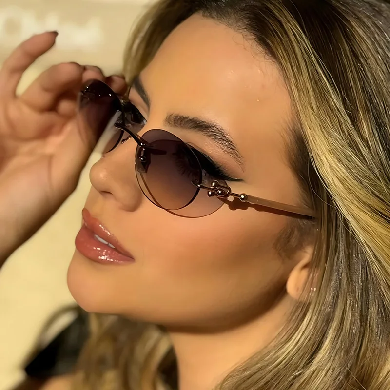 New Metal Frameless Oval Woman Sunglasses Luxury Brand Design Summer Sun Protection Sunnies Man Fashion Sunglasses UV400