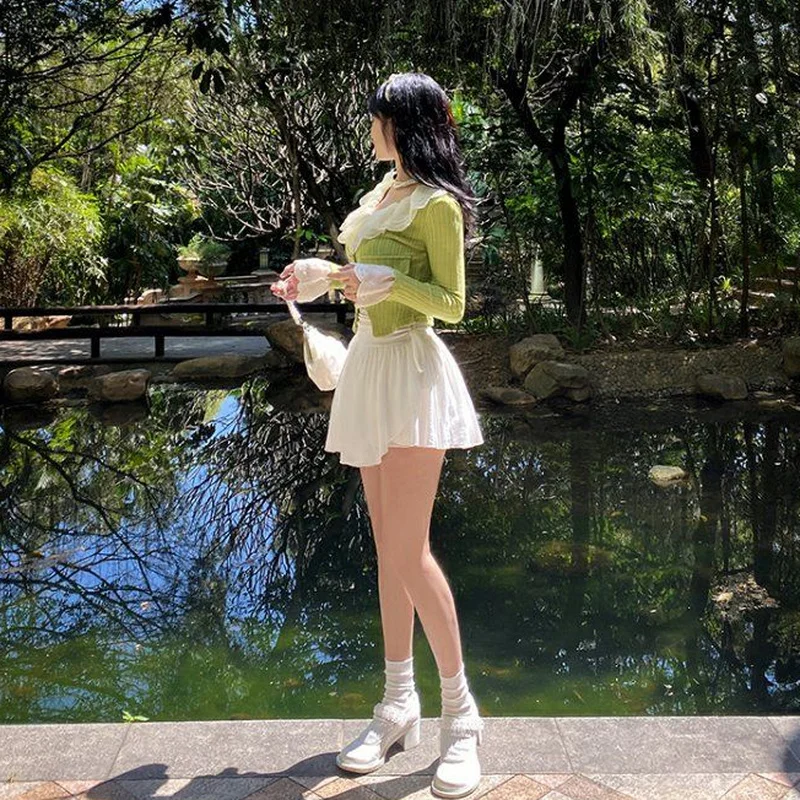 Sexy carino bianco minigonna donna coulisse pieghe vita alta irregolare volant Patchwork gonne corte Mori ragazza coulisse vestito