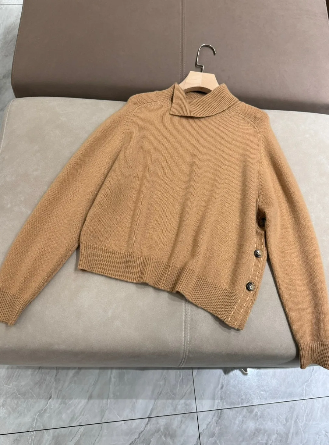 Loose solid color luxurious pure cashmere sweater with side buttons