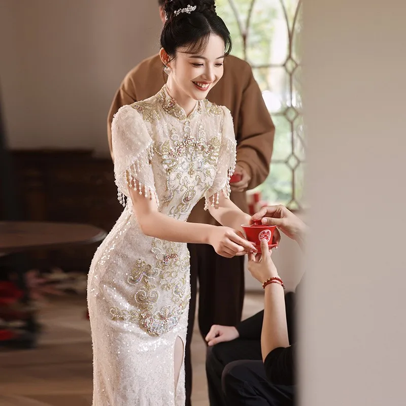 

New Chinese-style light luxury haute couture toasting and launching champagne-colored cheongsam dress