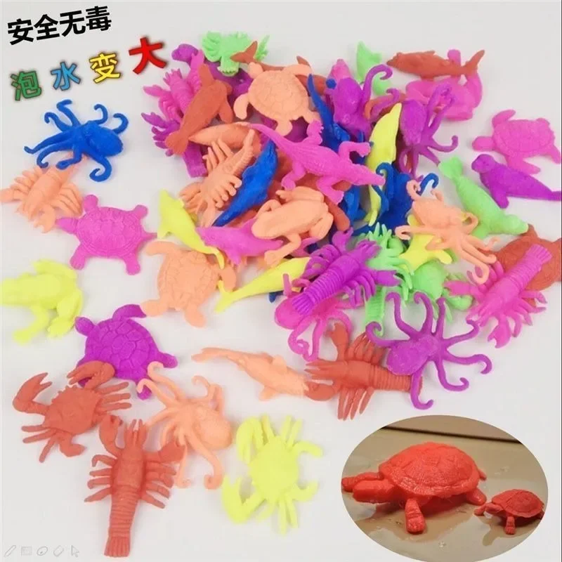 10pcs Magic Water Growing Ocean Creature Dinosaur Bath Education Toys Novelty Sea Life Land Animals Water Expandable Toys Funny