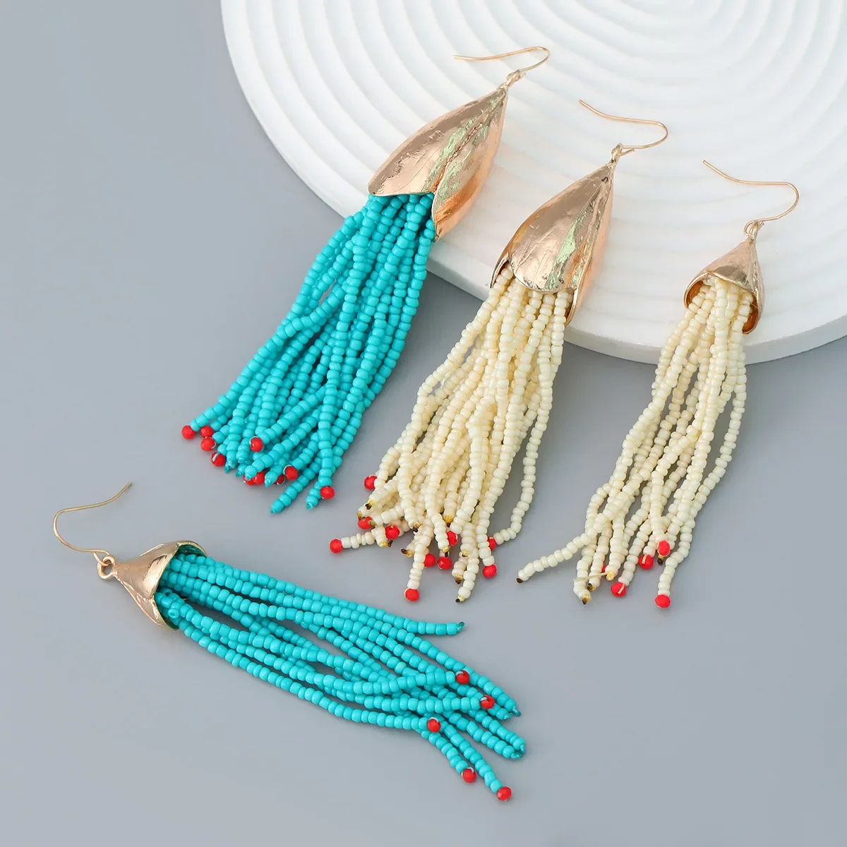 

Rice bead earrings Multilayer Tassel Fashion Hand weaving Alloy Bohemia Simplicity Beaded earrings