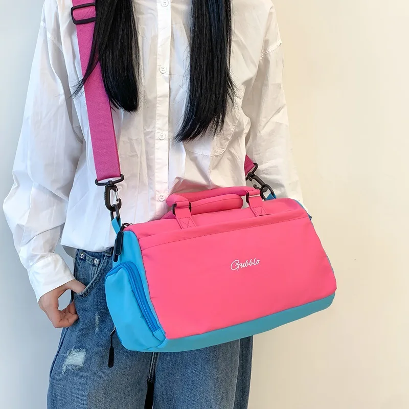 Women's Pink and Blue Color-Block Fabric Duffel Bag with Logo Print and Adjustable Strap Casual Travel Weekender Tote for Sports