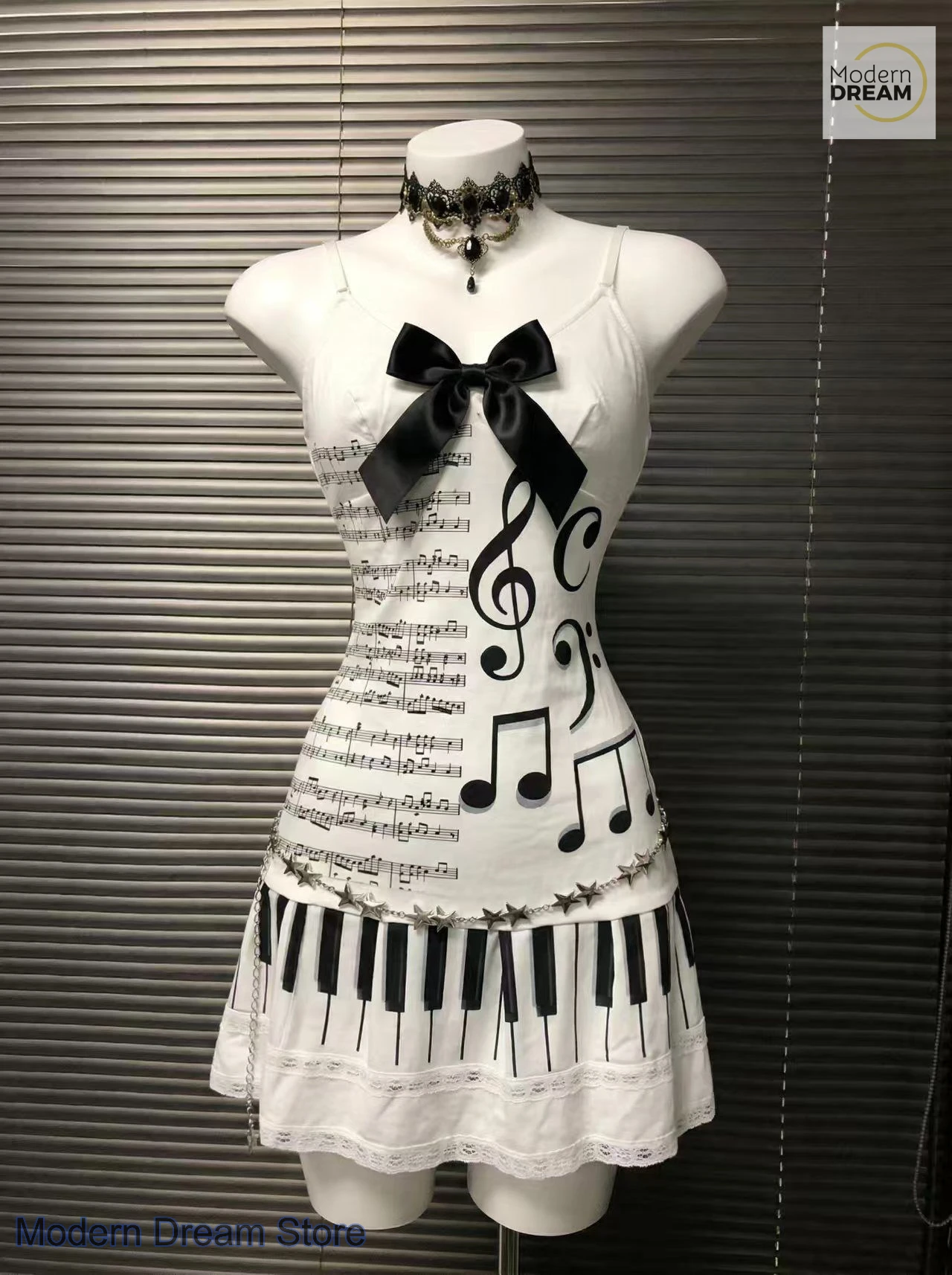 

Korean black and white notes piano key suspender dress women's summer new waist slimming lace Y2K spice girls casual skirt.