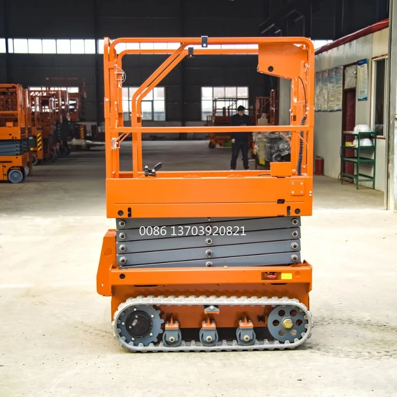 Hochwertige Rough Terrain Electric/Diesel Man Lift Raupenbetriebene Raupen-Scherenhebebühne zum günstigen Preis im Angebot
