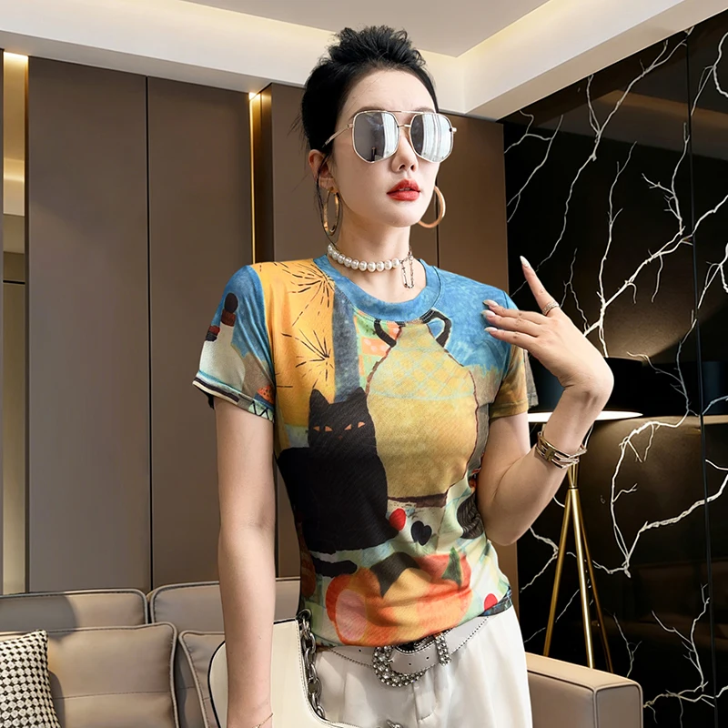 European Clothing Ladies T-shirt 2026 Summer New Short Sleeved Graffiti Printed Sunscreen Fashion Mesh Tops Casual Blouse