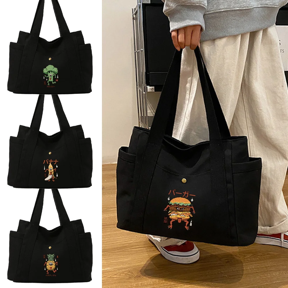 Multi Pocket Canvas Shoulder Bag Cute Monster Pattern with Sturdy Handles and Side Pockets for Everyday Carry and Work Bags