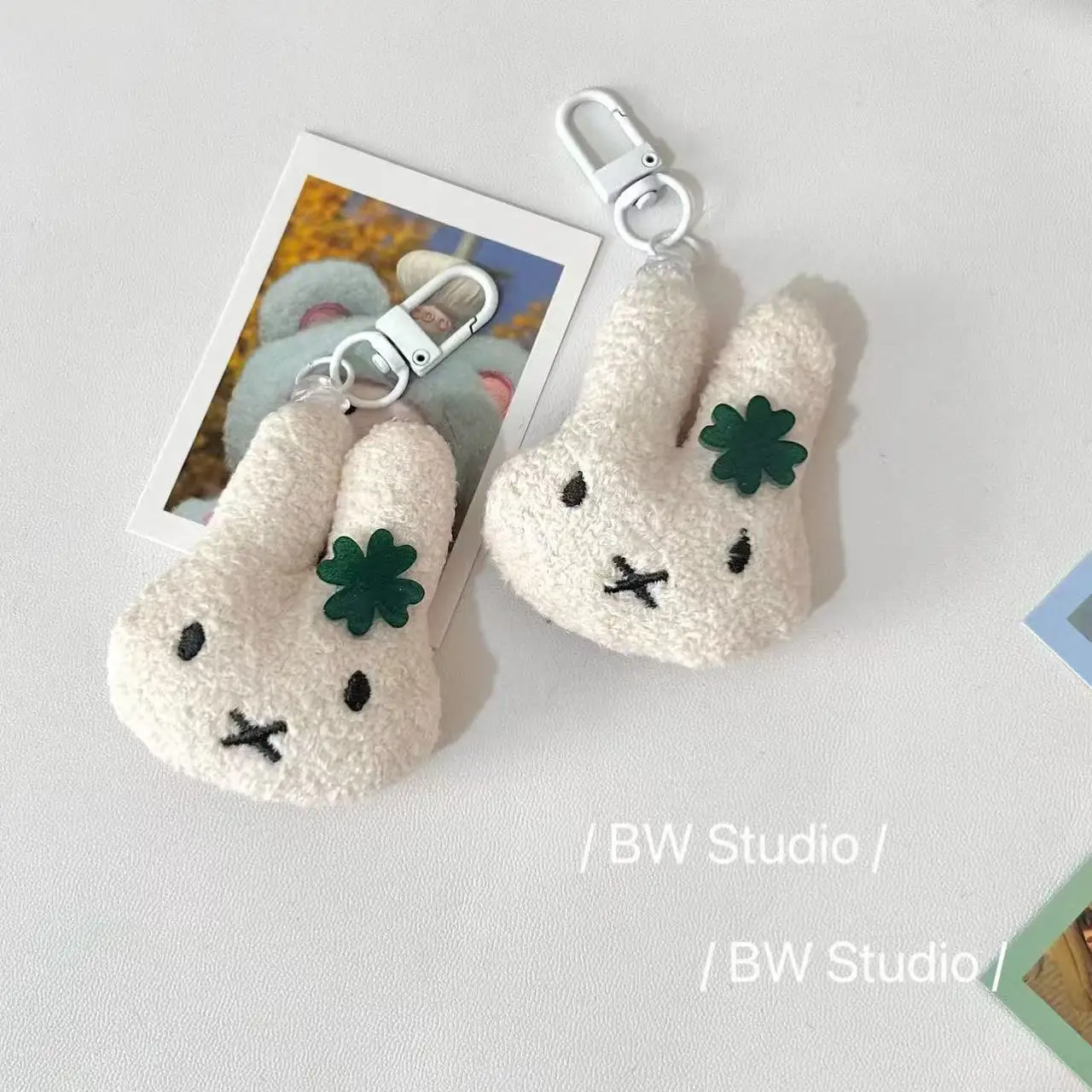 ミッフィーかわいいぬいぐるみウサギの頭キーホルダー漫画バックパックペンダント甘いピンクかわいい人形おもちゃ女の子の誕生日ギフト