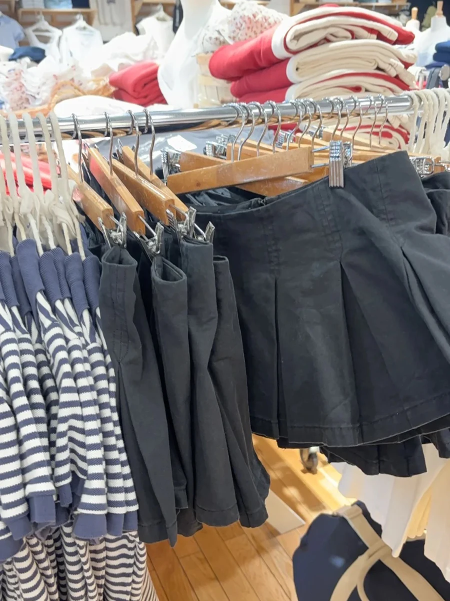 Vintage Sexy taille basse jupes plissées été nouveau noir coton a-ligne Shorts jupes femmes américain Streetwear solide Denim Faldas
