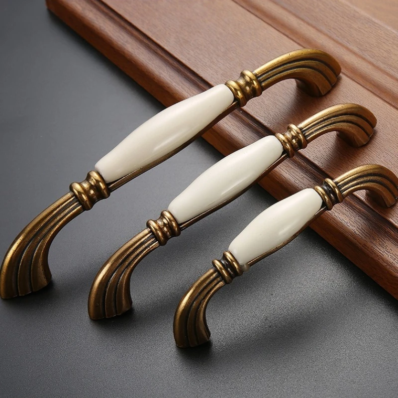 Perillas de cajón, manija de puerta de armario, herrajes para muebles europeos, manijas de gabinete blancas de cerámica de bronce antiguo de aleación de Zinc