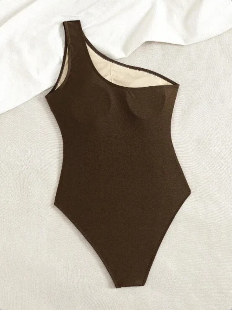 Costume da bagno intero monospalla 2026 sexy aderente e con schiena scoperta, tinta unita, elegante, per vacanze estive, set da spiaggia