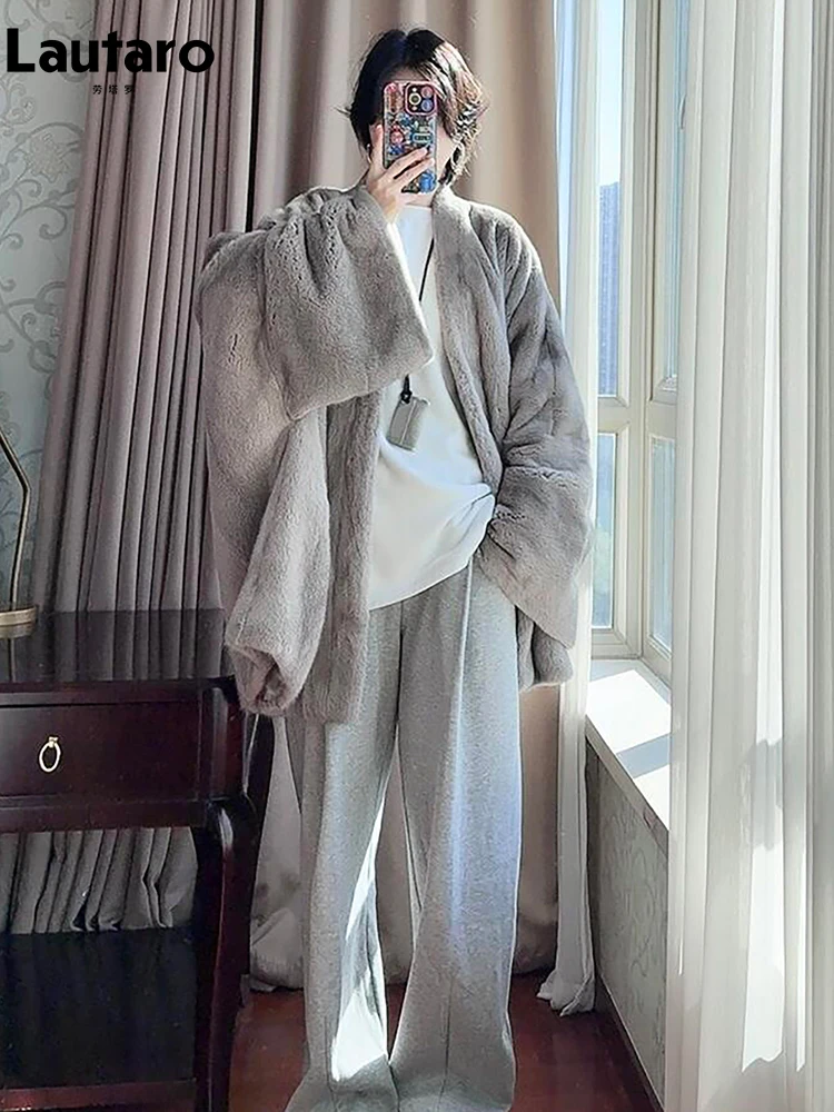 Lautaro Winter Luxury Elegant Loose Thick Warm Soft Bat Sleeved Faux Mink Fur Coat Women V Neck Stylish Chic Fluffy Jacket 2026