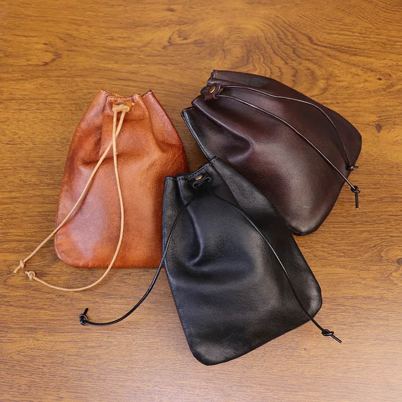 

Retro Style Cowhide Money Bag Handmade Portable Coin Purses Drawstring Change Pouch Leather Stationery Storage Coin Holder