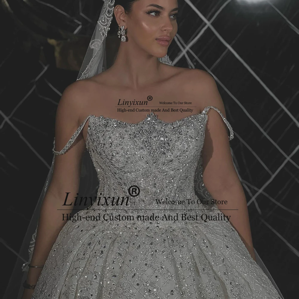 분리 가능한 기차가있는 럭셔리 스팽글 웨딩 드레스 민소매 인어 신부 가운 맞춤형 فساتين زفاف ٢٠٢٥ W