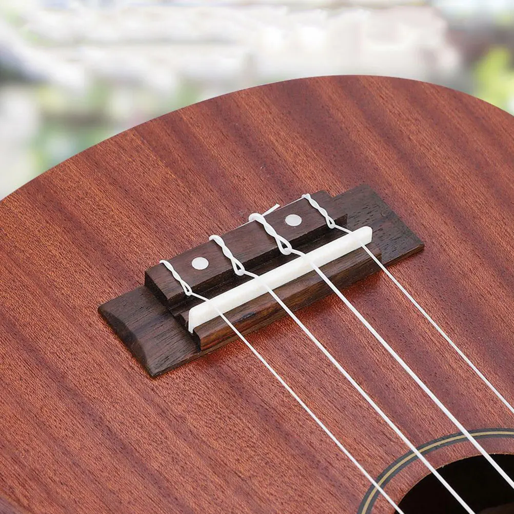 

1Set Ukulele Bridge Saddle Wooden Nut Adjustable Repair Parts Replacement Ukulele Accessories Instrument Repair Supplies