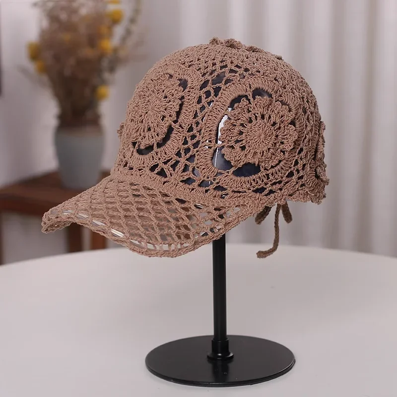 2025 verano Crochet ahueca hacia fuera las viseras de lujo señoras Casual Floral gorra con visera moda todo-fósforo al aire libre calle dulce gorra de béisbol