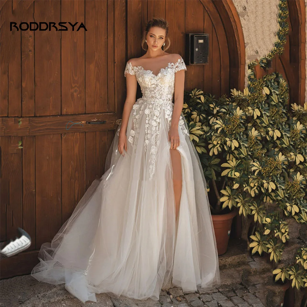 RODDRSYA Boho Trouwjurken voor Vrouwen 2023 Tulle Kant Applique 3D Bloem Hoge Sexy Bruidsgewaad De Mariée Vestids NoviaBoho Trouwjurken voor Vrouwen 2023 Tulle Kant Applique 3D Bloem Hoge Sexy Bruidsgewaad De Mariée Ve