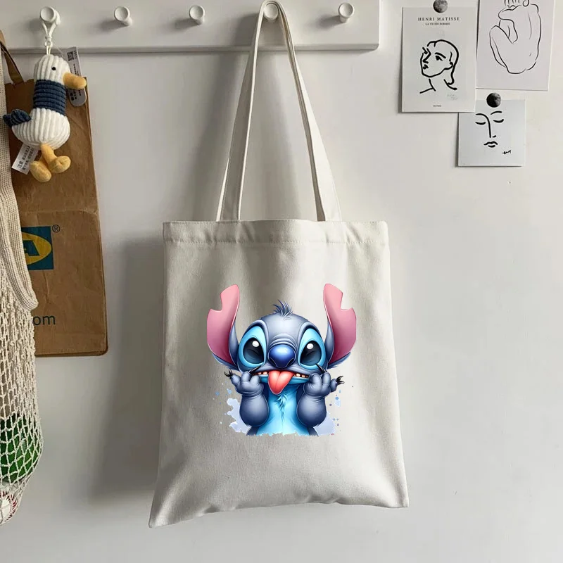 การ์ตูน Disney Stitch กระเป๋าถือผู้หญิง Casual Totes Underarm Top Handle กระเป๋า Lady ช้อปปิ้งกระเป๋าเดินทางผ้า/ผ้า/ผ้า/ผ้า/ผ้า/ผ้า/ผ้า/ผ้า/ผ้า/ผ้า/ผ้ากระเป๋าไหล่กระเป๋า