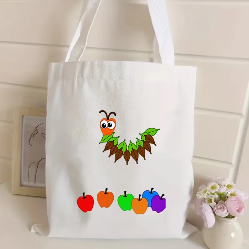 

Cute Hungry Caterpillar Apple Canvas Tote Bag Cartoon Kids Story Print Reusable Shoulder Bag Shopping Handbag For Girls Boys