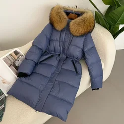 2024 inverno nuovo piumino d'anatra bianco vera pelliccia di volpe vera pelliccia di procione lungo cappotto con cappuccio donna Slim giacca calda moda Casual femminile