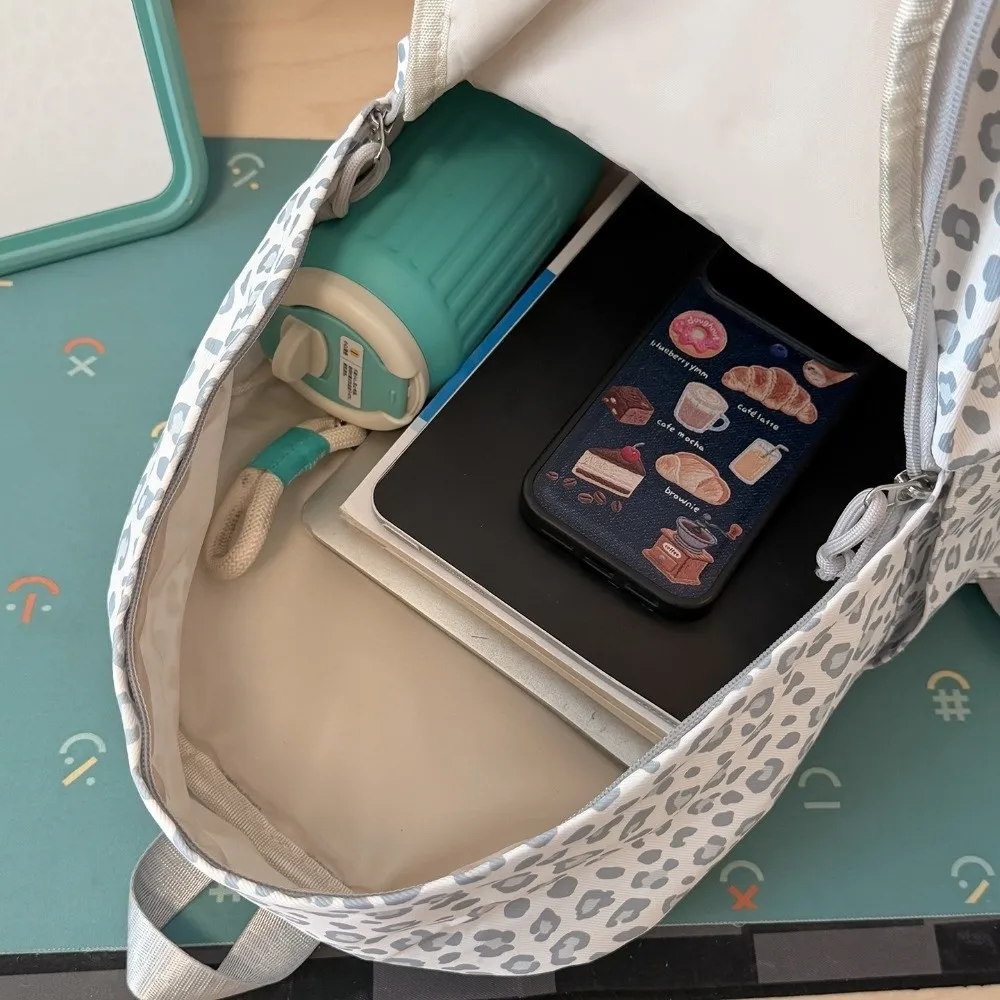 Unique Leopard Print Women Backpack Nylon Material Lightweight Design School Bag Unique Style Casual Daypack For Students