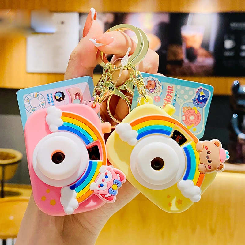 Yaratıcı gökkuşağı projeksiyon kamera oyuncak anahtarlık el feneri çocuk karikatür kolye anahtarlık kadın çantası araba anahtarlık hediye