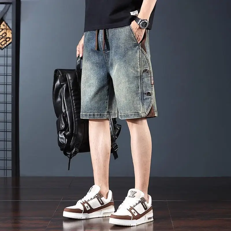 กางเกงขาสั้นผ้ายีนส์เฮฟวี่เวทอินเทรนด์ของผู้ชายสําหรับฤดูร้อนกางเกงห้าจุดประกบอเมริกันหลวม