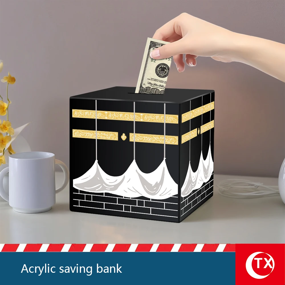 مستوحاة من الكعبة المشرفة في مكة، يجمع هذا الصندوق بين الإيمان والفائدة. تصميم مكعب أنيق باللونين الأسود والذهبي يرمز إلى القداسة والرقي. مثالي لشهر رمضان، عيد الفطر، أو كصندوق تبرع خيري للأطفال والبالغين
