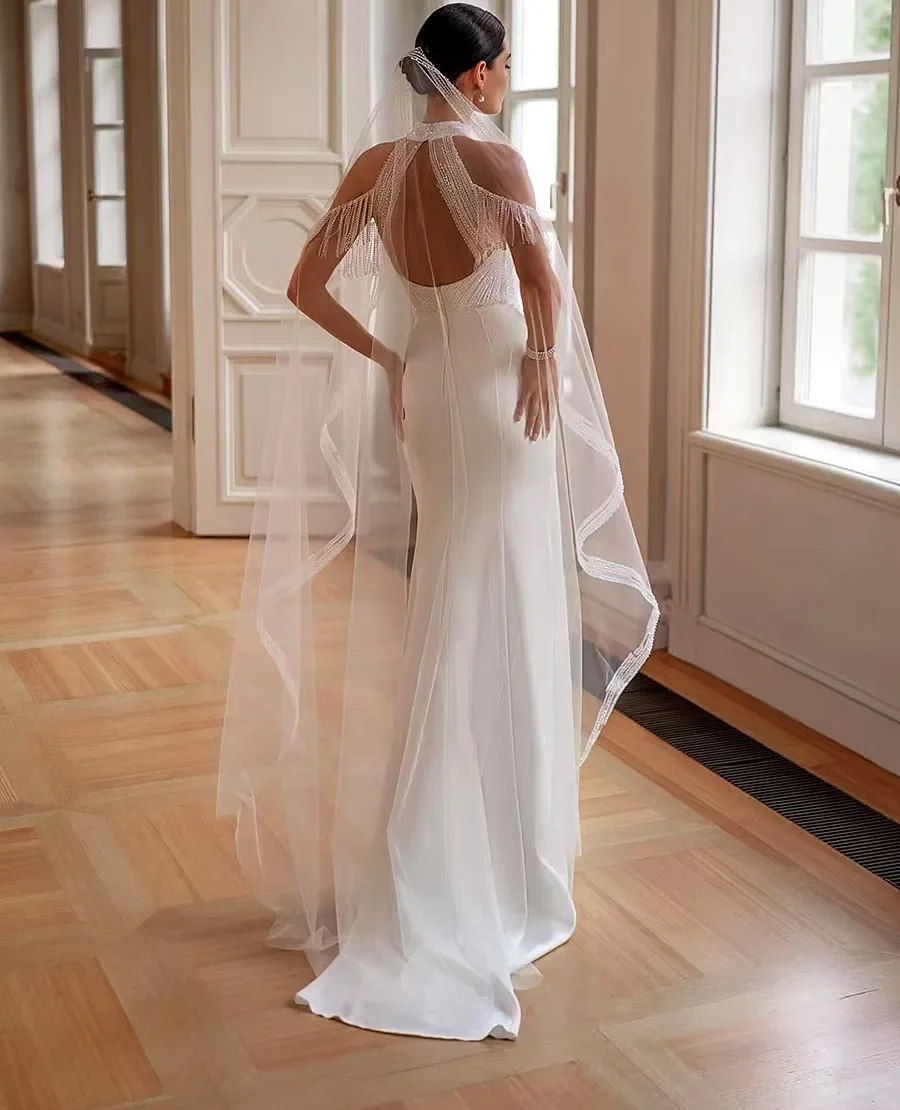 Vestido de novia de sirena sin mangas con cuello Halter Sexy personalizado para novia vestido de novia fruncido con borlas