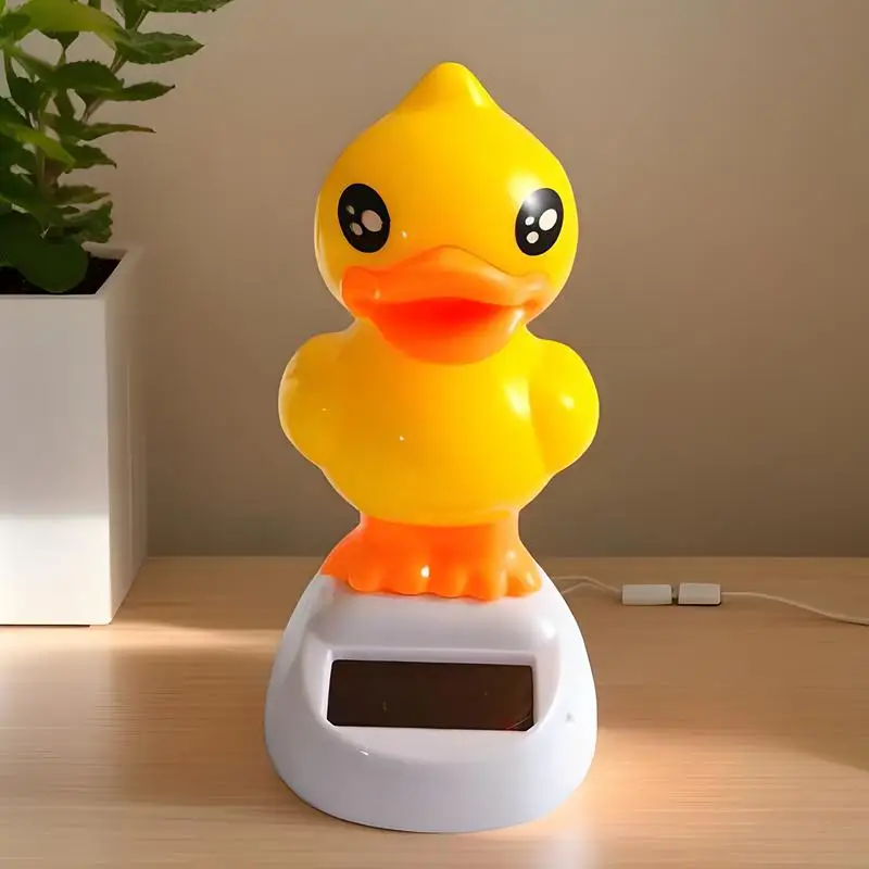 Pato amarelo painel do carro decoração solar pato amarelo adorável estatuetas animais brinquedo traço boneca para paisagem acessórios jardim