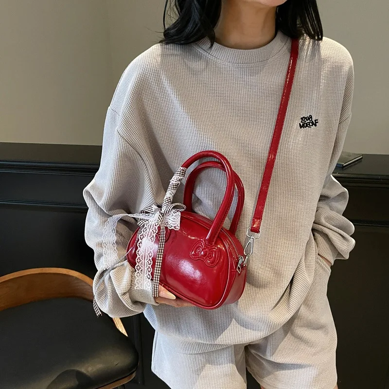 Torba damska wersja koreańska stylowa przenośna torba na poduszkę damska Superior Sense prosta koronkowa słodka torba na ramię typu crossbody urocza torba z kokardką