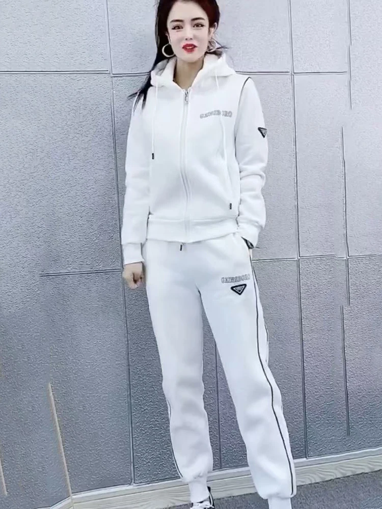 

Fashion casual sports set for women in autumn 2025 new zipper hooded jacket+ankle pants casual solid color two-piece set