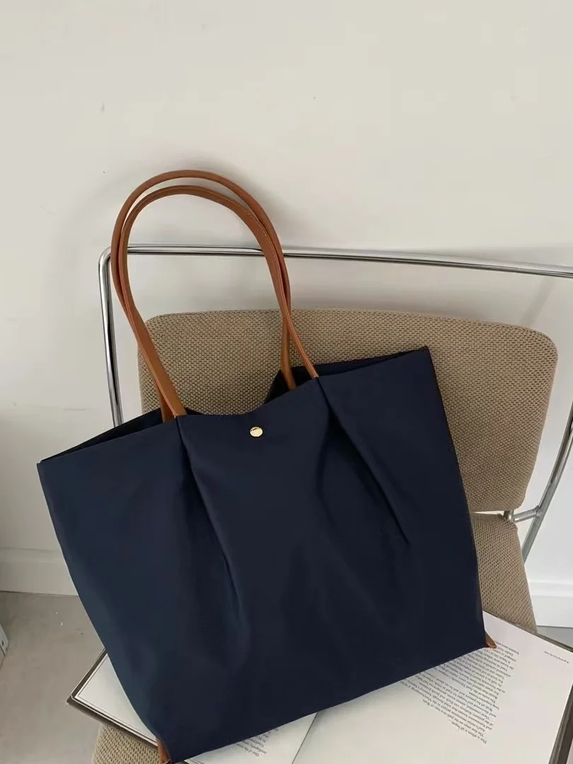 

Large Capacity Nylon Multi-layer Partition Shoulder Bag Dumpling Shape Waterproof Handbag for Ladies Daily Use You'rebag
