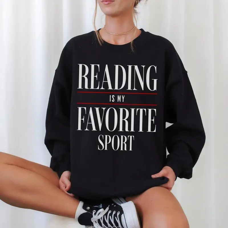 

Funny Book Lover Sweatshirt "Reading Is My Favorite Sport" Bookworm Graphic Pullover Unisex Teacher Gift Cotton Top