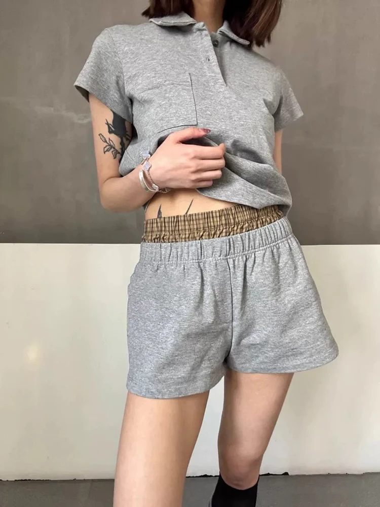 

The patchwork double-waisted casual shorts are stylish and versatile. The grey sporty women's shorts are the new autumn 2025