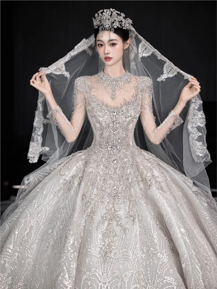

A new long-sleeved light-luxury heavy-duty large-sized haute tailline dress with textured main fabric