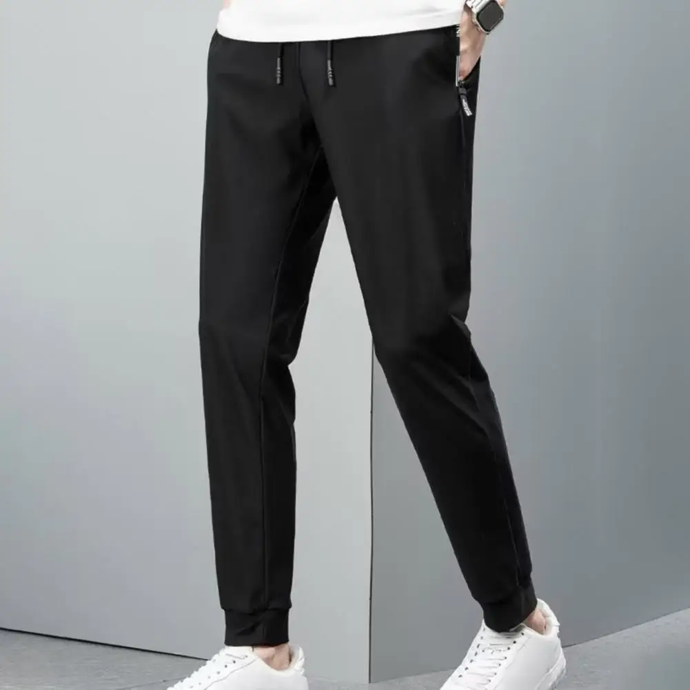 

Jogging Sweatpants Men's Loose Straight Drawstring Pants with Elastic Waist Pockets Breathable Ankle Length Sweatpants for Daily