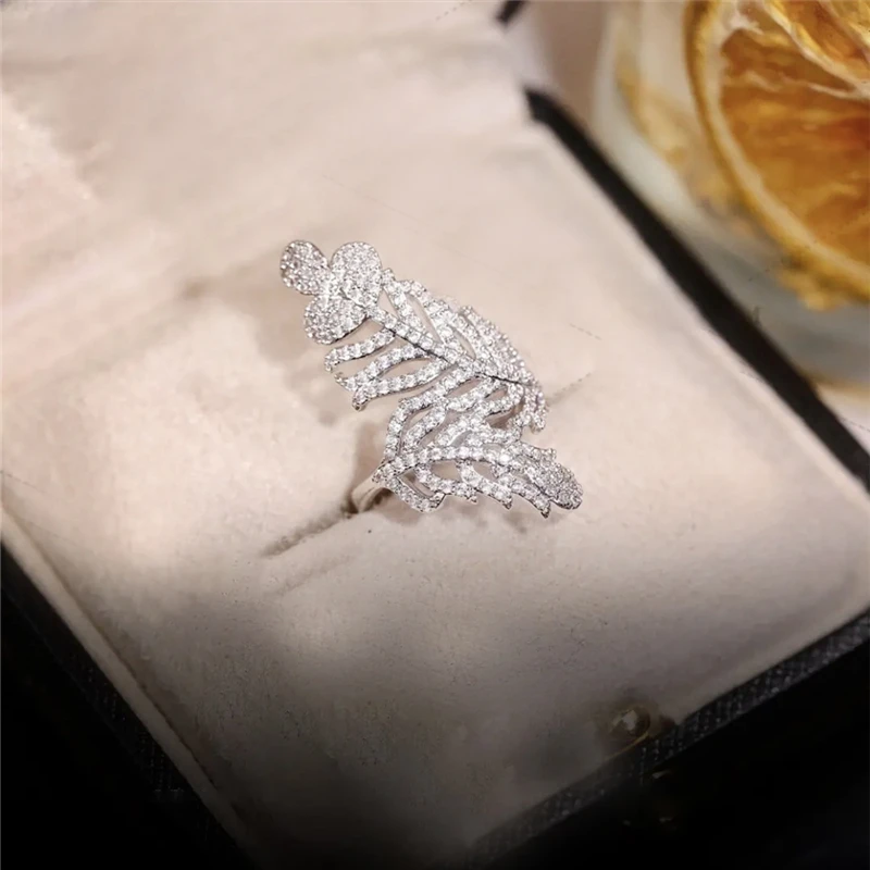 

Korean ins super flash exquisite full diamond feather sterling silver open ring light luxury niche versatile commuter jewelry