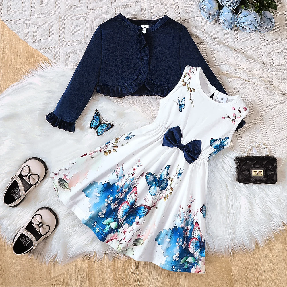 Girls' Two-Piece Dress Set, Featuring a Navy Blue Long-Sleeved Cardigan Paired with a White Base Dress with Blue Butterfly Print, with a Large Bow Decoration at the Waist. the Fabric Is Smooth and Comfortable, and the Elegant Cut Makes It Suitable for Various Occasions Such as Birthdays and Everyday Outings.