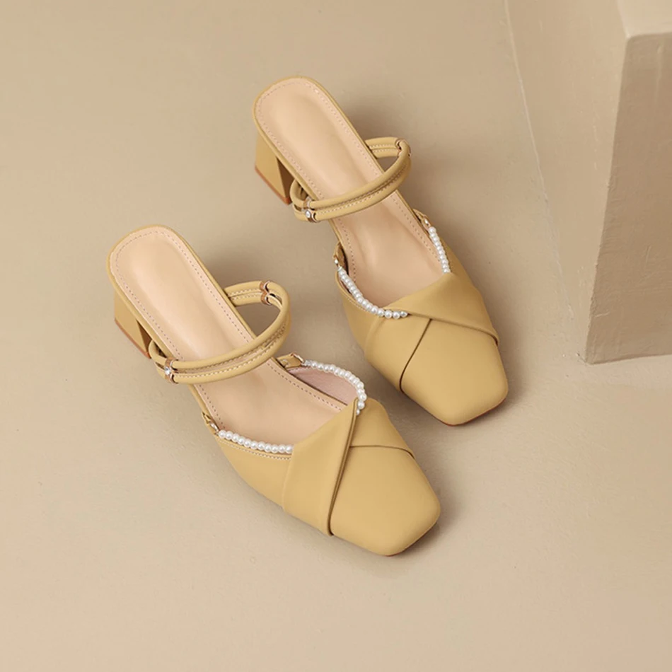 

The 2025 summer new style of women's single sandals with a toe cap, thick heels and a pair of elegant half-slippers for women