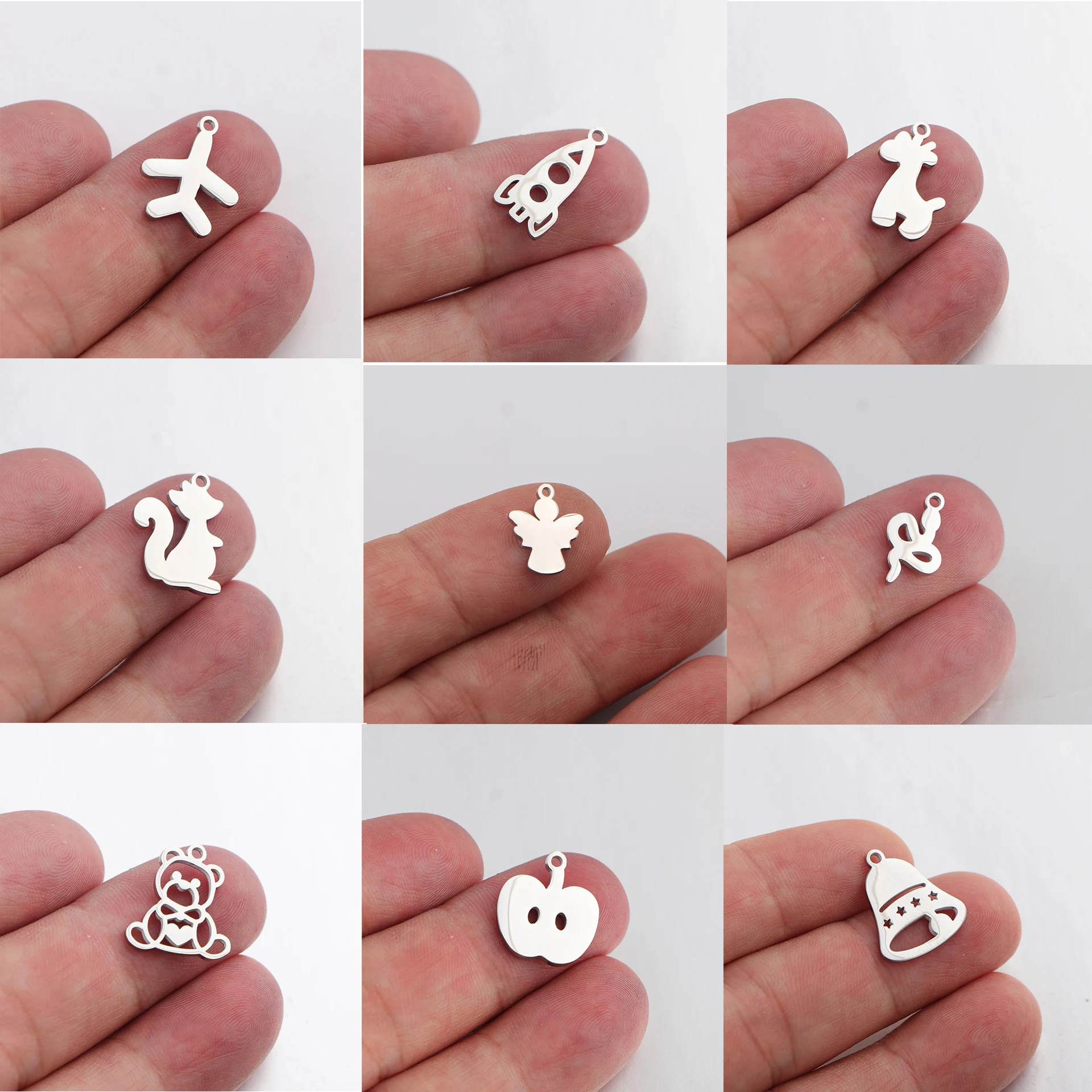 10pcs/lot Stainless Steel Airplane Rocket Giraffe Squirrel Angel Snake Bear Apple Bell Charms Pendant for DIY Jewelry Making