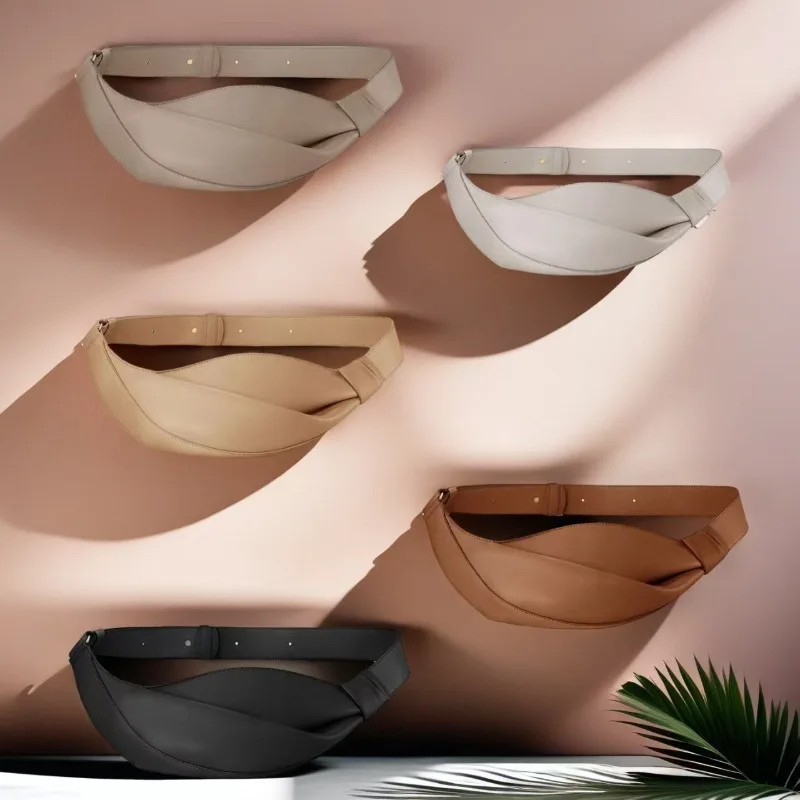 

2025 new cowhide dumpling shaped design cross arm two back versatile women's bag