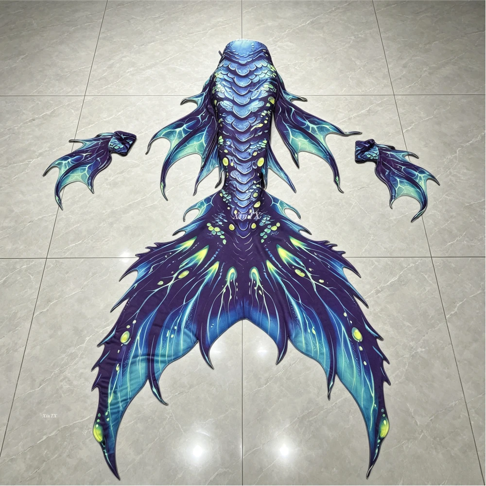 Professional mermaid tail swimsuit with realistic paired with a top and arm rings suitable for underwater photography swimming.