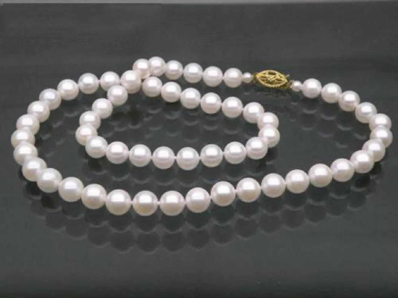 

20 inch AAA+10-11mm natural Akoya white round pearl necklace with 14k buckle