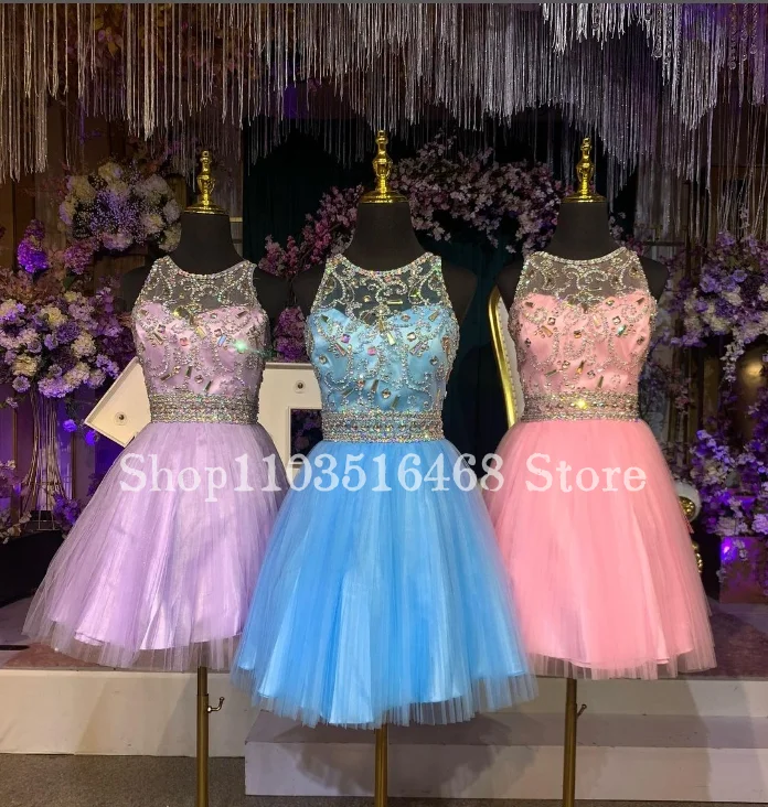 Luksusowe sukienki Diamante Mini Quinceanera 2024 Okrągły dekolt Kryształowy krawat z koralikami Koronkowe sukienki dla dziewczynek Vestidos De 15 Quinceañera