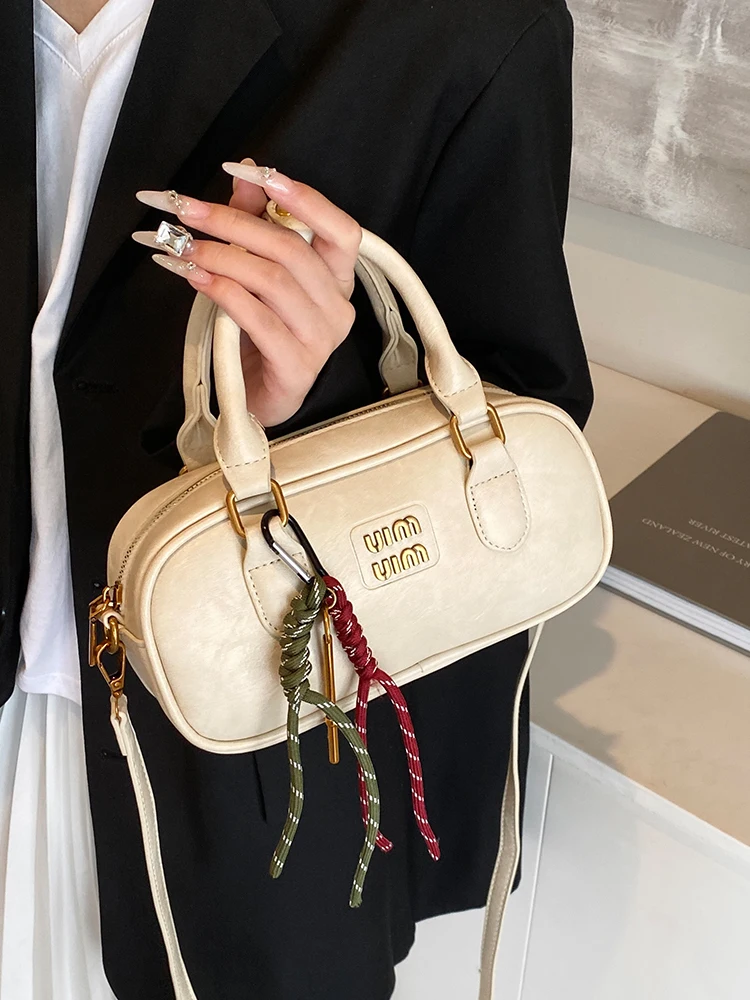 

Famous brand spring and autumn bags women's 2025 new all-match high-end designer shoulder bag messenger bag bowling bag handbag